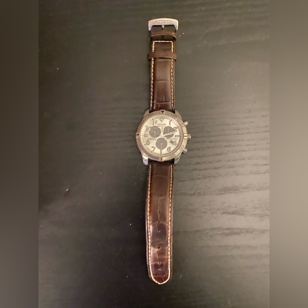 Men’s Citizens Watch with brown leather band.